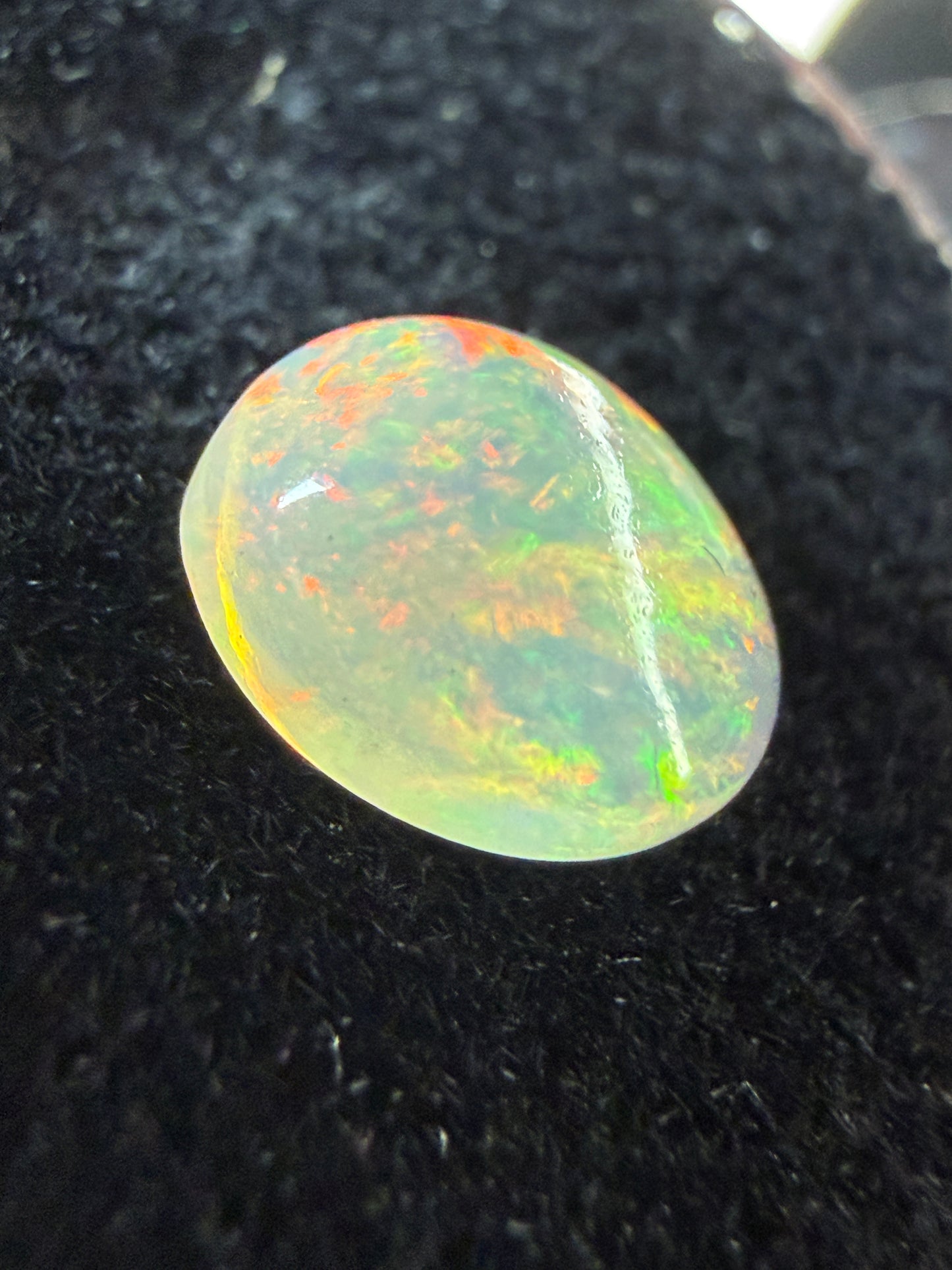 WOW!- Natural Welo Opal Cabochon 9x7x4mm, 1.35ct- Full-face broadflash/floral, red-dominant