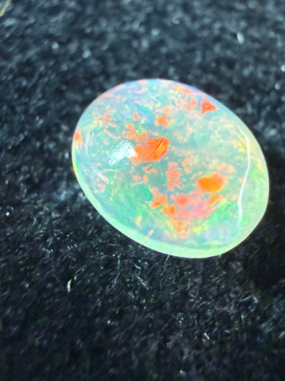WOW!- Natural Welo Opal Cabochon 9x7x4mm, 1.35ct- Full-face broadflash/floral, red-dominant