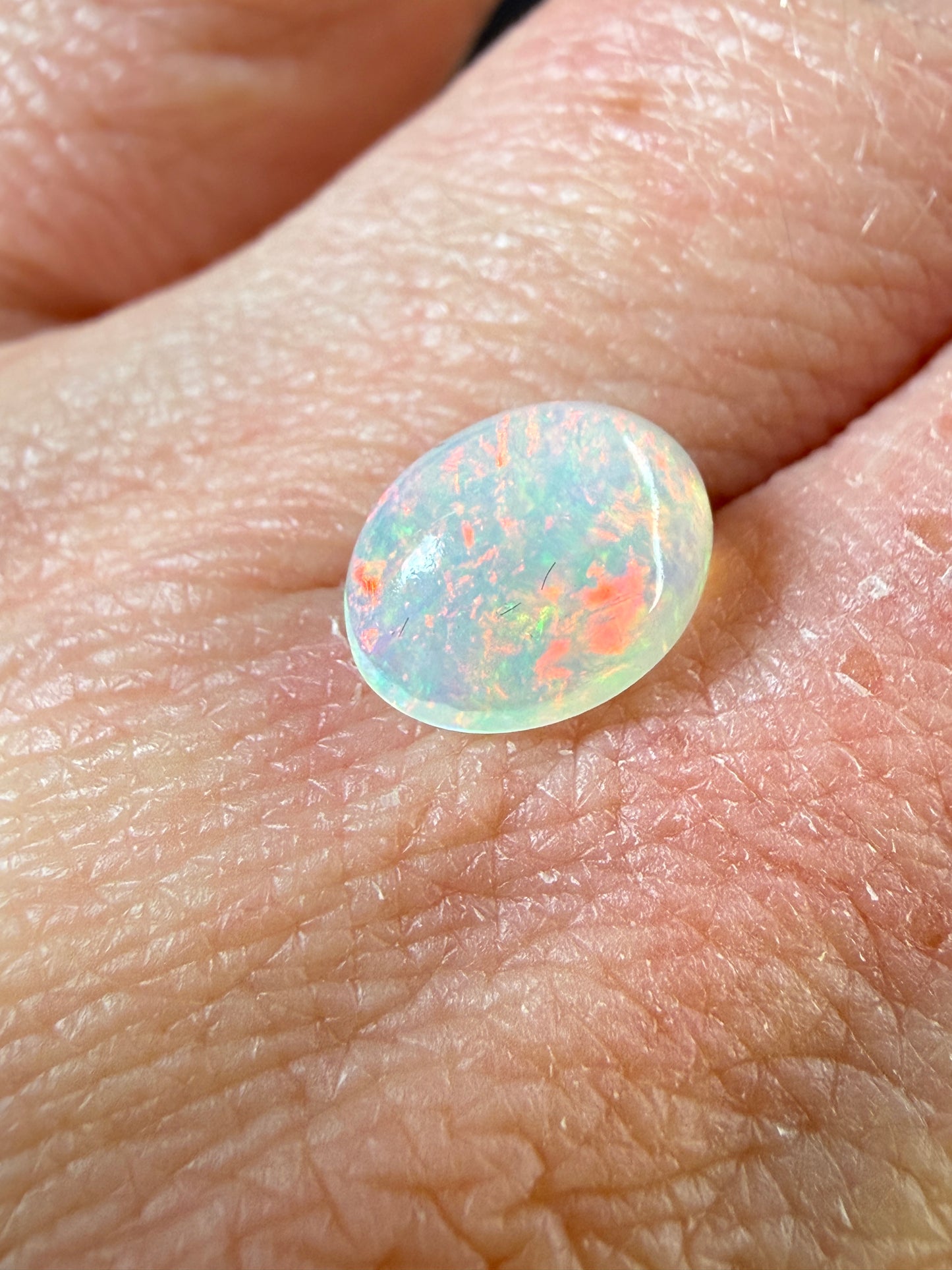 WOW!- Natural Welo Opal Cabochon 9x7x4mm, 1.35ct- Full-face broadflash/floral, red-dominant