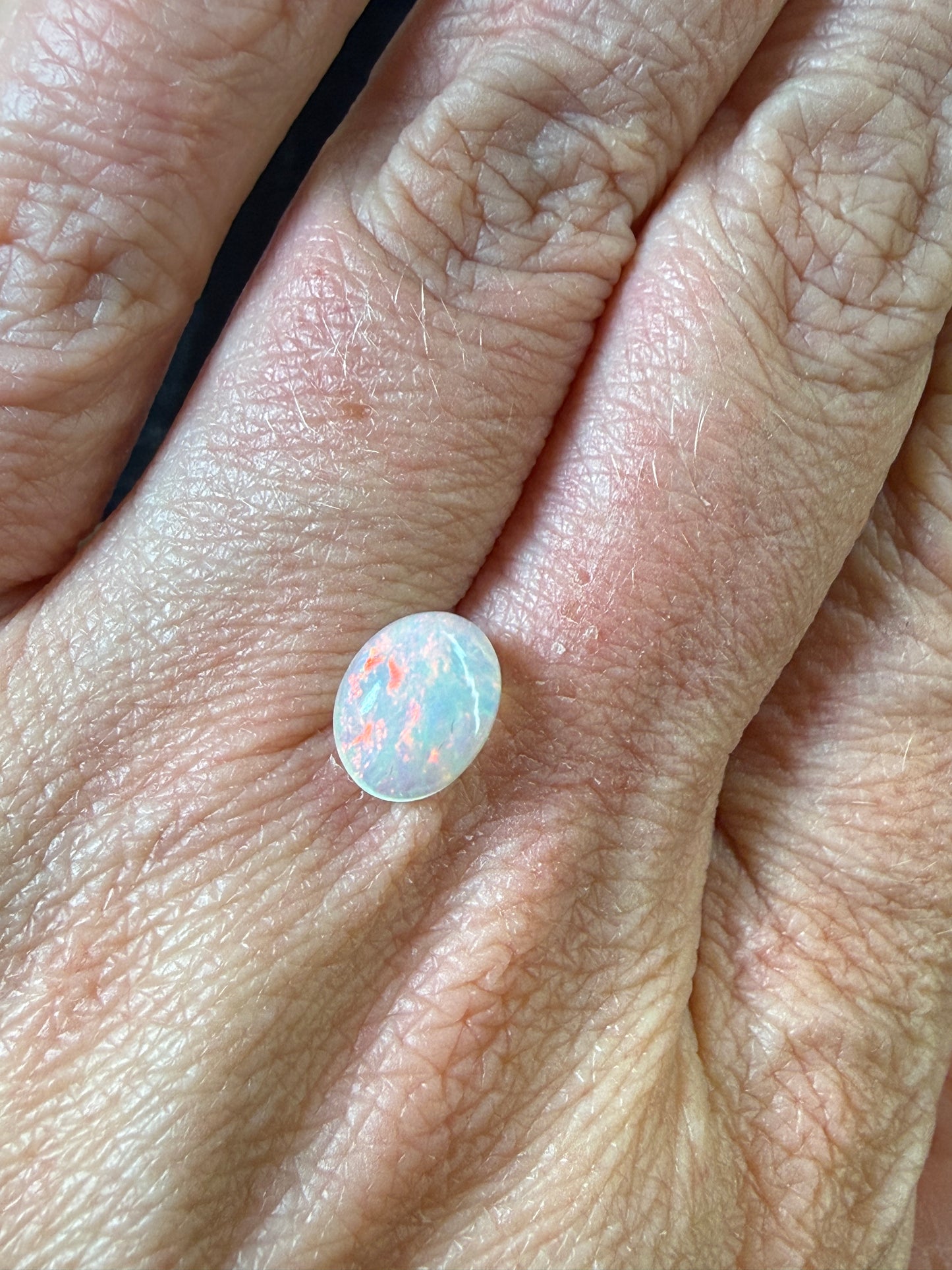 WOW!- Natural Welo Opal Cabochon 9x7x4mm, 1.35ct- Full-face broadflash/floral, red-dominant