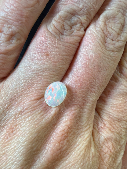 WOW!- Natural Welo Opal Cabochon 9x7x4mm, 1.35ct- Full-face broadflash/floral, red-dominant