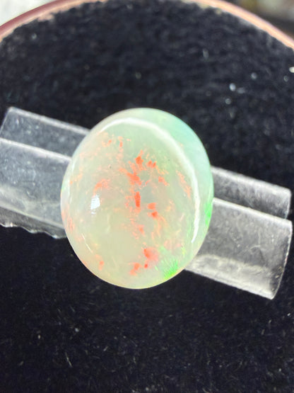 Natural Welo Opal Cabochon 11x9x4mm, 1.85ct- Broadflash/floral, rolling directional