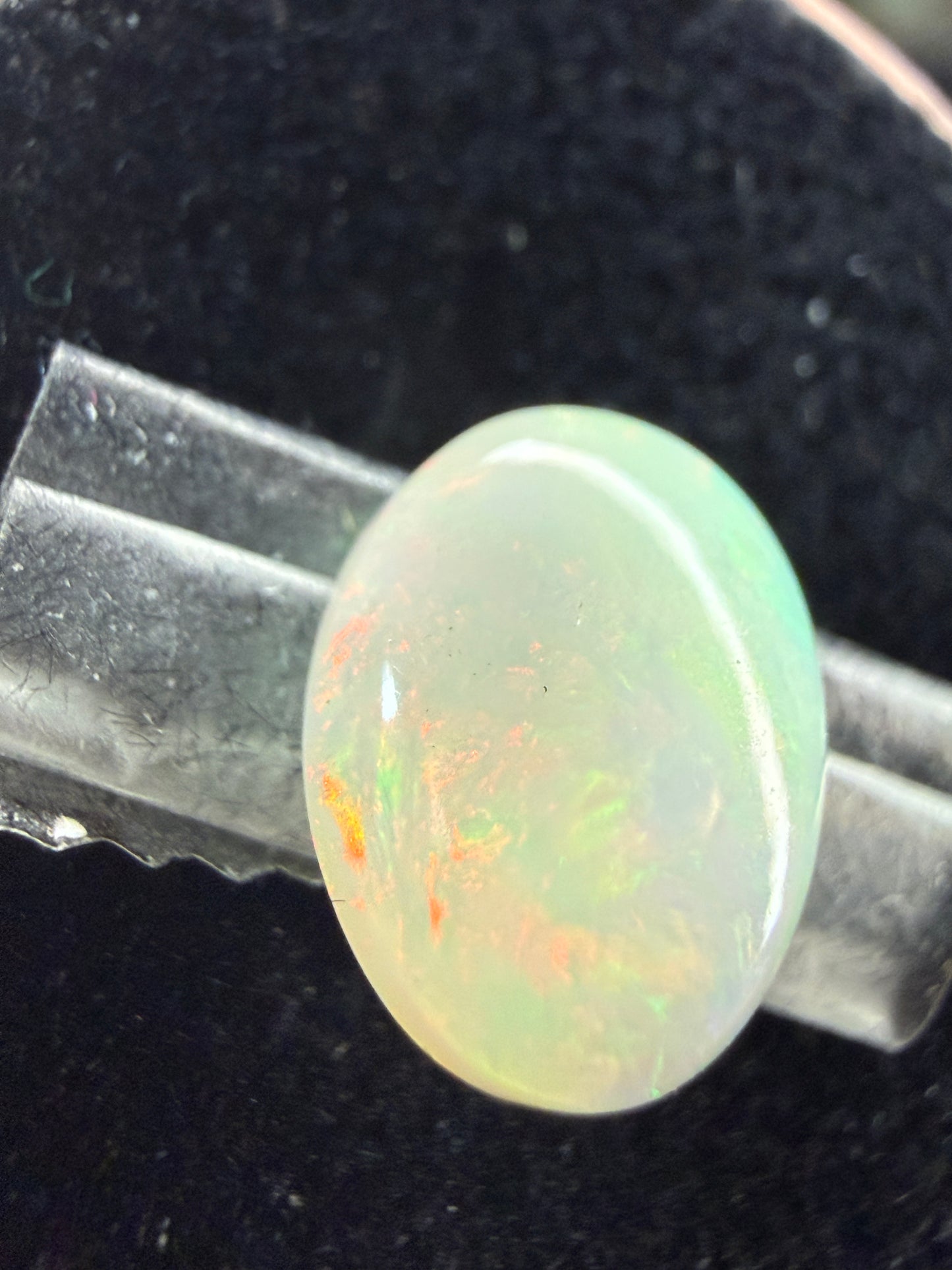 Natural Welo Opal Cabochon 11x9x4mm, 1.85ct- Broadflash/floral, rolling directional