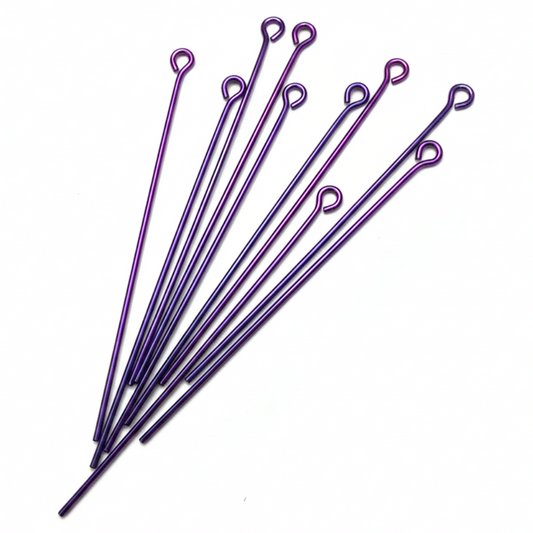 The Crystalary Reactive Metals Studio purple and violet anodized niobium eye pins for jewelry making