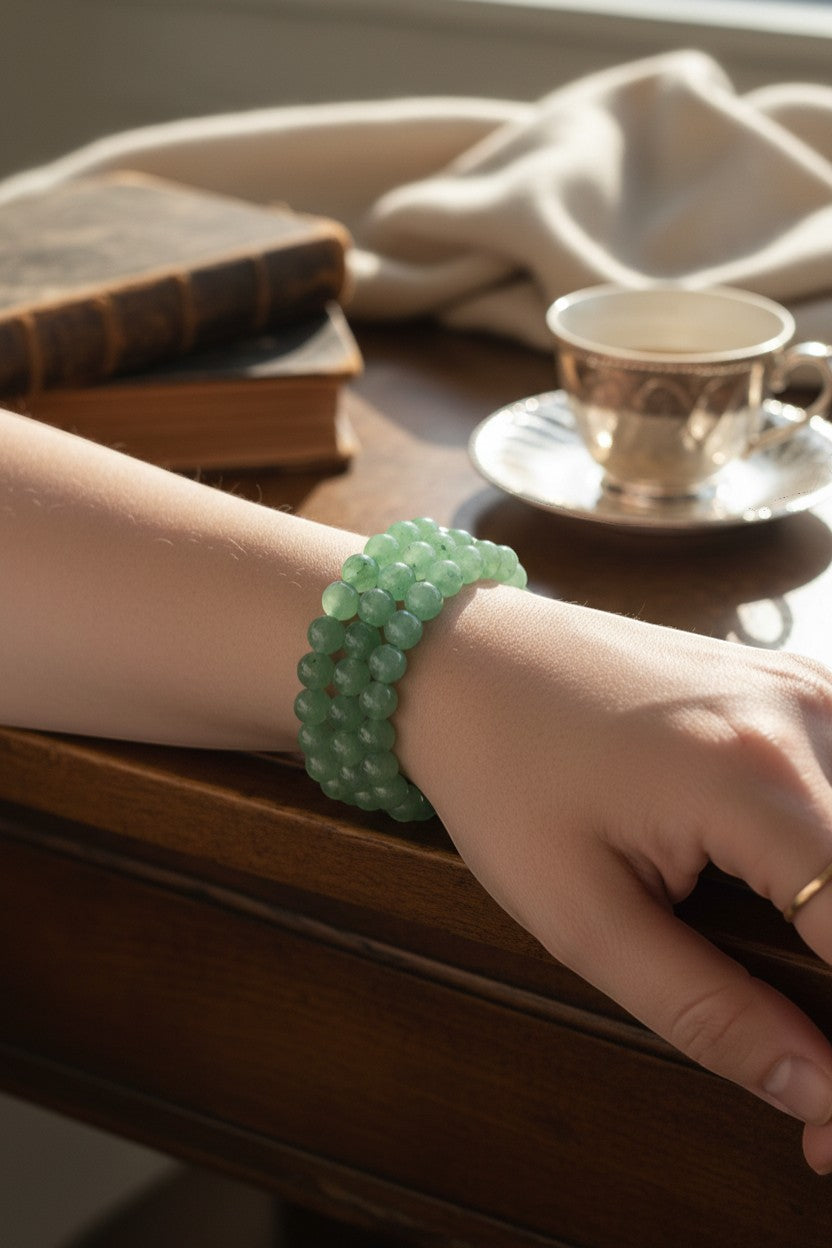 The Crystalary green aventurine crystal beaded bracelet on elastic band, 7.5 inches long.