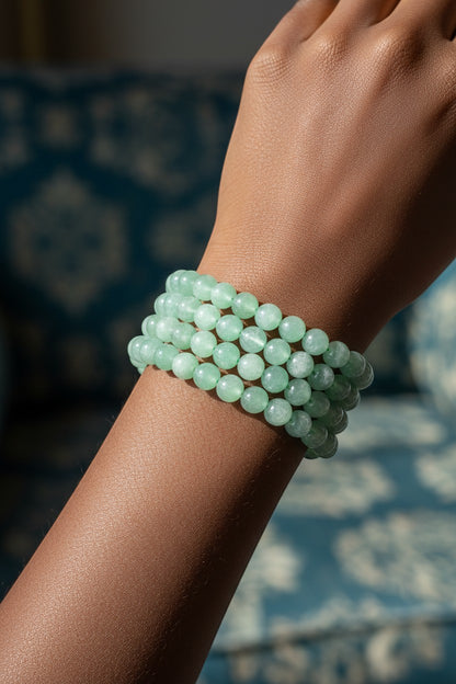 The Crystalary green aventurine crystal beaded bracelet on elastic band, 6mm, 8mm, or 10mm beads.